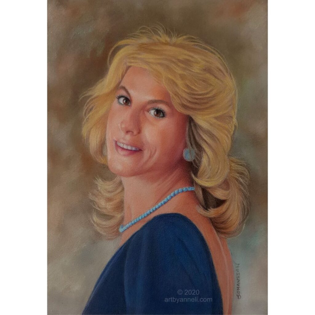 A drawing of a woman with blue earing by Anneli Johansson